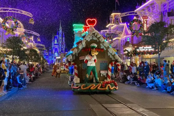 goofy's gingerbread house in mickey's once upon a christmastime parade