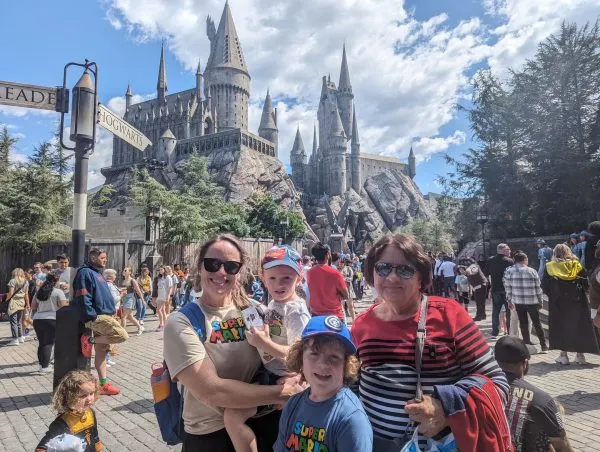 Casey, boys, and her mom at Hogwarts
