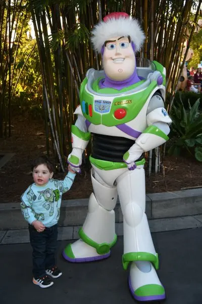 Jackie's son meeting Buzz. 