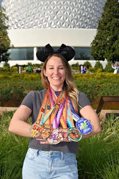 Kellen with medals at Epcot