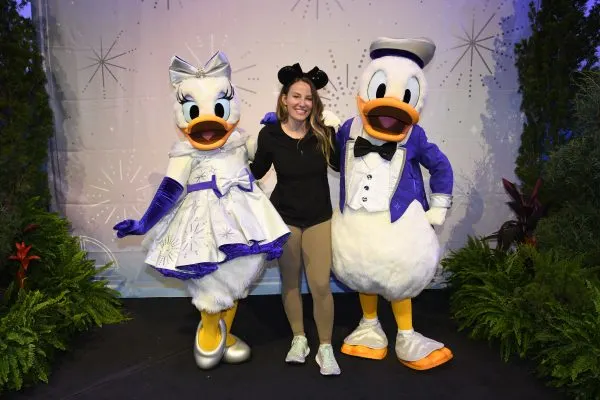 Kellen with Daisy and Donald