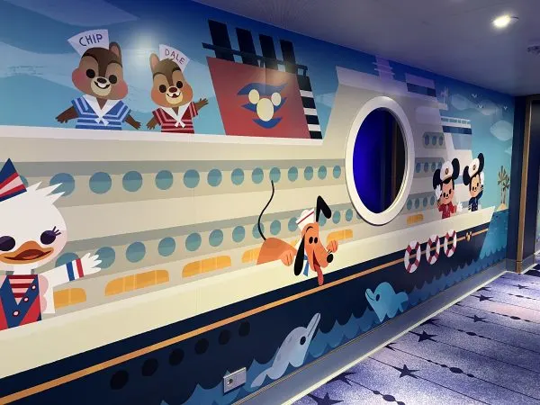 Mural of Disney Cruise Line ship outside of the Oceaneer Club and Lab on the Disney Wish