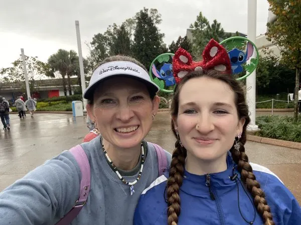 Sara and daughter waiting in the rain
