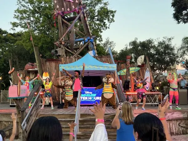 DJ, dancers, and Chip and Dale on main stage at H2O Glow 2024