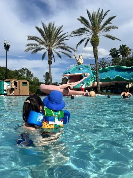 Kelly and son at Port Orleans French Quarter pool

