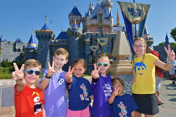Kiley and her kids in front of the castle