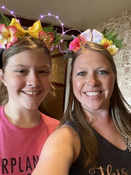 Stephanie and her daughter making their own Mickey ears