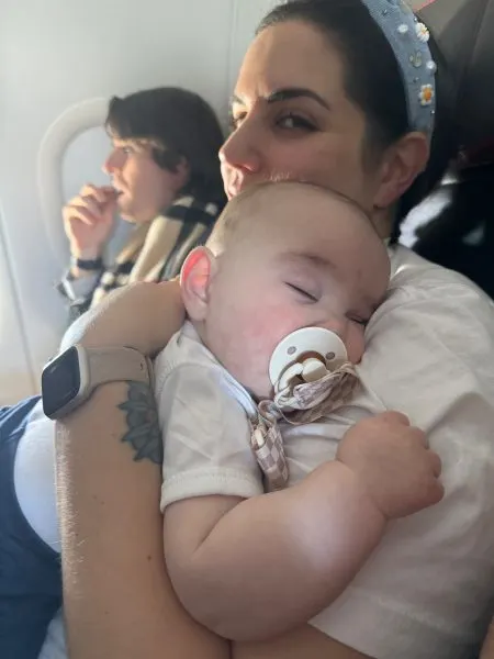 Nicole and her daughter on the plane.