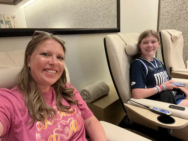 Stephanie and her daughter getting pedicures