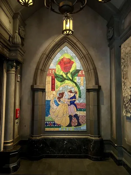 be our guest stained glass window of belle and prince