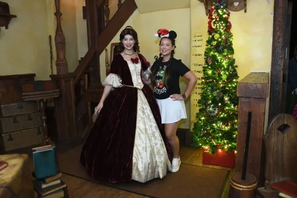 belle in red holiday dress at mvmcp