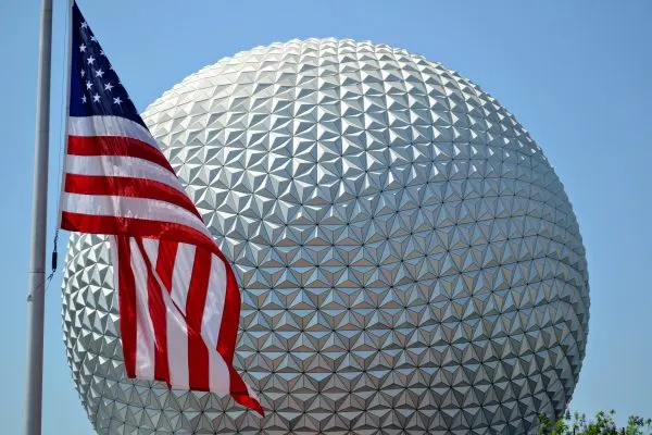 spaceship earth with a flag