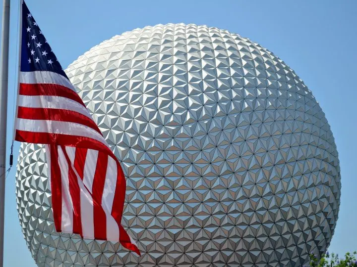 spaceship earth with a flag