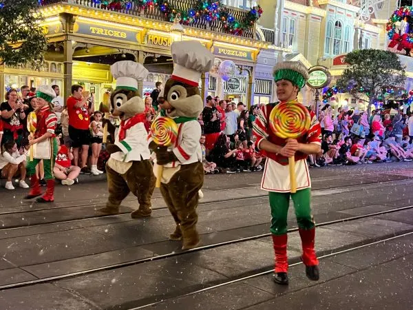 chip and dale during mickey's once upon a christmastime parade