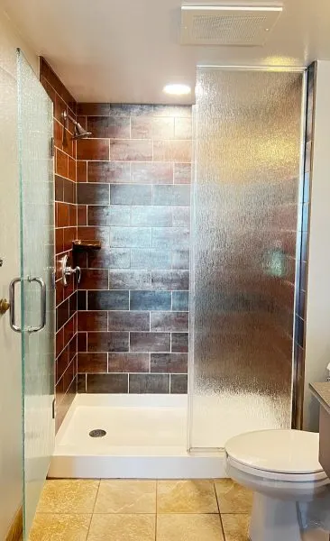 shower and toilet attached to queen bedroom in finding nemo family suite