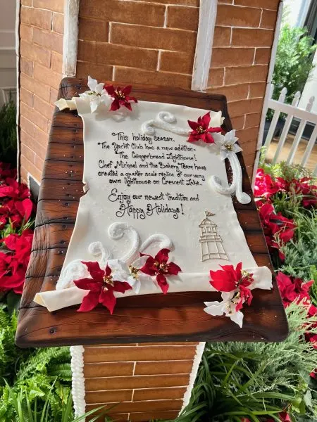 gingerbread lighthouse sign at yacht club