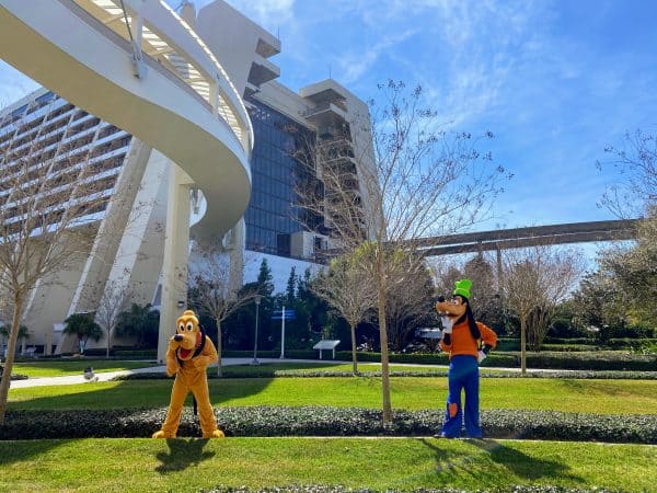 contemporary resort goofy and pluto on the lawn
