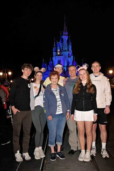 Group in front of castle at night