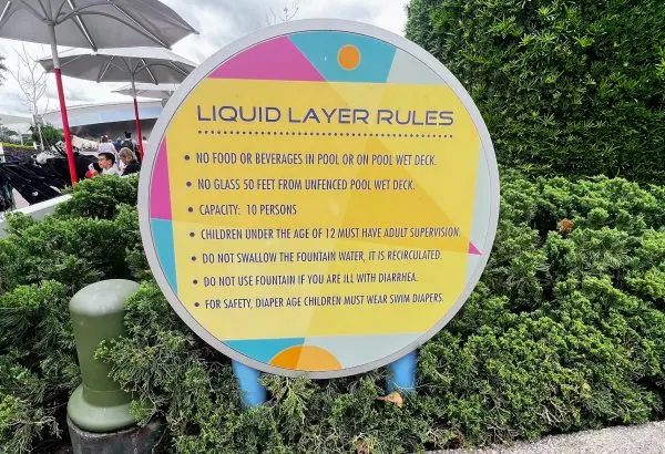 liquid layer water play area rules at epcot