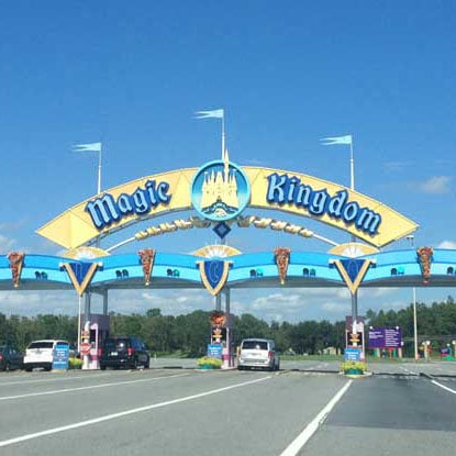 when visiting disney how do you get from the parking lot to the magic kingdom
