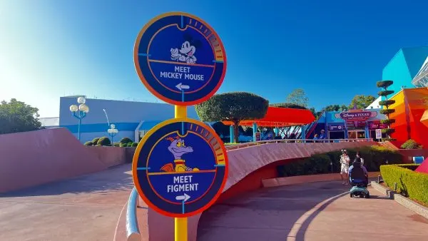 mickey and figment meet and greet signs at epcot in imagination pavilion
