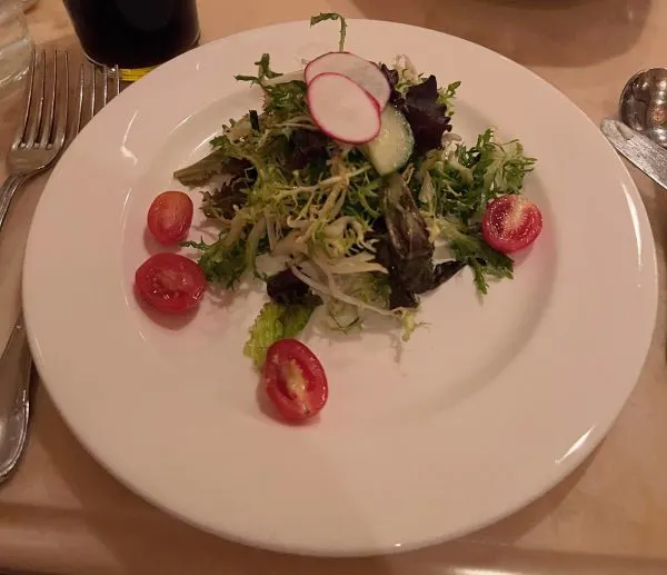 mixed greens salad appetizer at be our guest