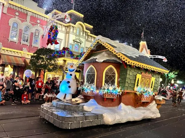 olaf float during mickey's once upon a christmastime parade
