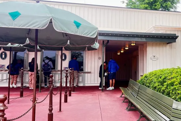 restrooms next to guest services at the entrance to magic kingdom
