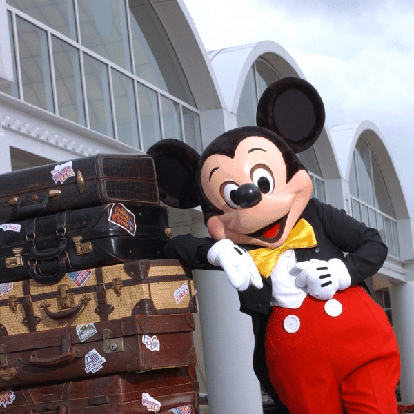 Mickey Mouse with luggage
