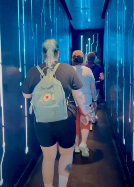 backpacks and bags in tron queue