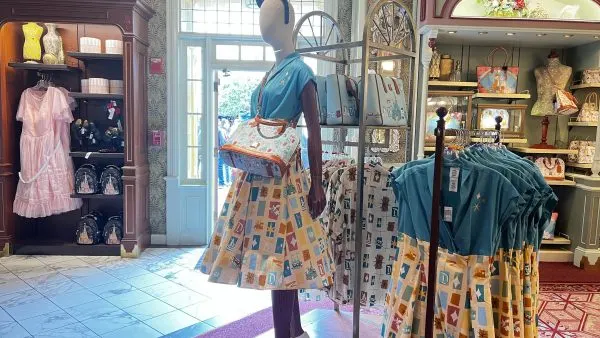 dresses and dooney and bourke bags inside uptown jewelers