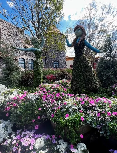 anna and elsa topiaries at epcot flower and garden festival